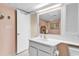 The bathroom includes a large mirror over the sink and a storage unit at 741 Retreat Beach Circle # B-1-A, Pawleys Island, SC 29585