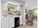 Entertainer's dream: wet bar adjacent to a comfortable living space at 741 Retreat Beach Circle # B-1-A, Pawleys Island, SC 29585