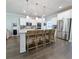 Bright kitchen features a large island, stainless appliances, and breakfast bar with seating at 748 Old Murrells Inlet Rd., Murrells Inlet, SC 29576
