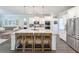 Spacious kitchen with large island, granite countertops, stainless appliances, and breakfast bar at 748 Old Murrells Inlet Rd., Murrells Inlet, SC 29576