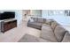 Upstairs living room area with large sectional sofa, TV and decor at 748 Old Murrells Inlet Rd., Murrells Inlet, SC 29576