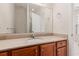 Bathroom featuring single sink with granite countertops and wood cabinets at 750 Howard Ave. # E, Myrtle Beach, SC 29577