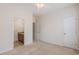 Clean bedroom with carpet, a ceiling fan, and attached bathroom at 750 Howard Ave. # E, Myrtle Beach, SC 29577