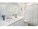 White bathroom featuring a vanity and shower with curtain at 775 Harrison Mill St., Myrtle Beach, SC 29579