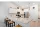 Bright, modern kitchen featuring granite countertops, stainless steel appliances, and stylish barstool seating at 775 Harrison Mill St., Myrtle Beach, SC 29579
