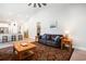 Bright living room with vaulted ceilings, hardwood style floors, and view to kitchen with bar seating at 775 Harrison Mill St., Myrtle Beach, SC 29579