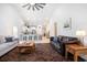 Open-concept living room showcasing modern design elements and a seamless transition into the kitchen area at 775 Harrison Mill St., Myrtle Beach, SC 29579