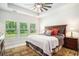 Comfortable main bedroom featuring bright, natural light, a ceiling fan and tray ceilings at 775 Harrison Mill St., Myrtle Beach, SC 29579