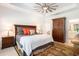 Spacious main bedroom featuring tray ceilings, ceiling fan, bedside tables and closet at 775 Harrison Mill St., Myrtle Beach, SC 29579