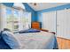 Bedroom with ample natural light from a large window and double door closet at 824 Dunoway Ct., Myrtle Beach, SC 29579