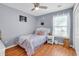 Cozy bedroom with wicker furniture, light gray walls, and hardwood floors at 824 Dunoway Ct., Myrtle Beach, SC 29579