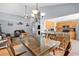 Dining area adjacent to living room and kitchen; great natural light and stylish fixtures at 824 Dunoway Ct., Myrtle Beach, SC 29579