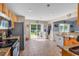 Bright kitchen with stainless steel appliances, granite countertops, and sliding doors to the backyard at 824 Dunoway Ct., Myrtle Beach, SC 29579