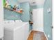 Functional laundry room with washer, dryer, and ample storage space at 824 Dunoway Ct., Myrtle Beach, SC 29579