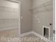 Functional laundry room with shelving, utility sink, and washer/dryer hookups at 866 Fowler Rd., Conway, SC 29526