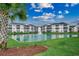 Beautiful condominiums overlooking a pond with a fountain, offering scenic views and a serene atmosphere at 901 West Port Dr. # 305, North Myrtle Beach, SC 29582