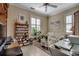 Functional home office space with tile flooring, shelving, and a comfortable seating area at 901 West Port Dr. # 305, North Myrtle Beach, SC 29582