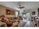 Open living area with sliding door to patio and decorated in neutral tones with tropical touches at 901 West Port Dr. # 305, North Myrtle Beach, SC 29582