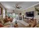 Comfortable living space featuring tiled floor and patio access with plenty of comfortable seating at 901 West Port Dr. # 305, North Myrtle Beach, SC 29582