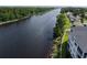 Aerial view of waterway with lush landscaping and green spaces, providing a serene environment at 901 West Port Dr. # 305, North Myrtle Beach, SC 29582