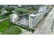 Panoramic aerial view of condos with river access, swimming pool, and tennis court at 9400 Shore Dr. # 617, Myrtle Beach, SC 29572