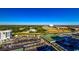 Scenic aerial shot of resort property showcasing lush landscaping, tennis courts, and nearby waterway at 9400 Shore Dr. # 617, Myrtle Beach, SC 29572
