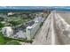 Aerial view of the tennis court and outdoor pool next to the beach at 9400 Shore Dr. # 617, Myrtle Beach, SC 29572