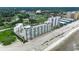 Wide aerial shot of a large complex on the beach with beautiful water views at 9400 Shore Dr. # 617, Myrtle Beach, SC 29572