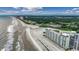 Expansive aerial view of beachfront condos and manicured lawns at 9400 Shore Dr. # 617, Myrtle Beach, SC 29572