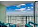 Enjoy ocean views from the balcony with comfortable chairs overlooking the beach at 9400 Shore Dr. # 617, Myrtle Beach, SC 29572