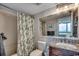 Well-maintained bathroom features granite counters, vanity, shower, and toilet at 9400 Shore Dr. # 617, Myrtle Beach, SC 29572