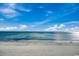 Panoramic ocean view highlighting a sandy beach and blue sky with gentle waves at 9400 Shore Dr. # 617, Myrtle Beach, SC 29572