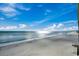 Serene ocean and beach view featuring the blue sky and horizon with gentle waves at 9400 Shore Dr. # 617, Myrtle Beach, SC 29572