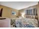 Cozy bedroom with twin beds and tropical-themed decor for a relaxing stay at 9400 Shore Dr. # 617, Myrtle Beach, SC 29572