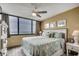 Inviting bedroom boasts ocean view, ceiling fan, and comfortable bedding at 9400 Shore Dr. # 617, Myrtle Beach, SC 29572