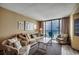 Cozy living room with comfortable seating and breathtaking balcony ocean views at 9400 Shore Dr. # 617, Myrtle Beach, SC 29572