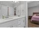 Modern bathroom with double sinks, marble countertop, and neutral color palette at 945 Waterbridge Blvd., Myrtle Beach, SC 29579