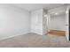 Inviting bedroom showcasing neutral carpet and an open doorway leading to another room at 1004 Kinness Dr., Conway, SC 29527