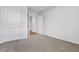 Bedroom with neutral walls and carpet, showing doorways at 1004 Kinness Dr., Conway, SC 29527