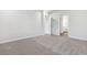 Bedroom with neutral walls and carpet, featuring doorways at 1004 Kinness Dr., Conway, SC 29527