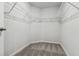 Walk-in closet with wire shelving and neutral carpeting at 1004 Kinness Dr., Conway, SC 29527
