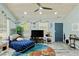 Comfortable living room featuring a daybed, ceiling fan, and a view to the front porch at 10071 Kings Rd., Myrtle Beach, SC 29572