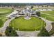 Stunning aerial view of the clubhouse with lush green surroundings and pristine landscaping at 1009 World Tour Blvd. # 105, Myrtle Beach, SC 29579
