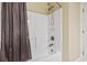 Bright bathroom featuring a white tub and shower combination with neutral walls at 1009 World Tour Blvd. # 105, Myrtle Beach, SC 29579