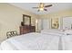 Bedroom showcasing two beds and a wooden dresser next to closet and doorway leading to bathroom at 1009 World Tour Blvd. # 105, Myrtle Beach, SC 29579