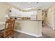 Well-equipped kitchen with ample counter space and modern appliances at 1009 World Tour Blvd. # 105, Myrtle Beach, SC 29579