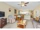 Open-concept layout with living area, dining space, and a view to the kitchen at 1009 World Tour Blvd. # 105, Myrtle Beach, SC 29579