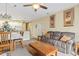 Comfortable living room with sofa, coffee table, and dining area at 1009 World Tour Blvd. # 105, Myrtle Beach, SC 29579