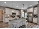 Modern kitchen featuring stainless steel appliances, granite countertops, and bright white cabinetry at 101 Karlie Ln., Aynor, SC 29511