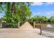 Inviting wooden boardwalk perfect for lakeside strolls, complemented by sturdy railings and scenic views at 1107 Woodside Dr., Conway, SC 29526